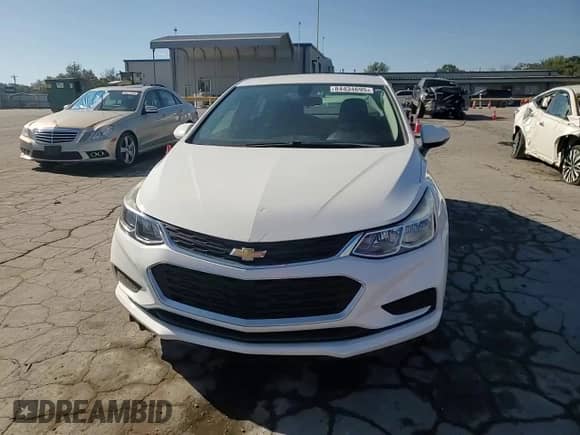 2018 Chevrolet Cruze LS z VIN 1G1BC5SM5J7162477, wystawiony jako Copart lot #84434695 z przebiegiem 69 588 mil mil oraz Szkoda całkowita • Salvage title. Historia ofert i sprzedaży dostępna na DreamBid. Obrazek 13.