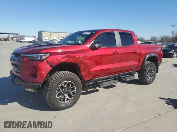 2023 Chevrolet Colorado 4WD ZR2 с VIN 1GCPTFEK2P1230663, выставлен на аукционе Copart как лот 42185015 с пробегом 5 927 миль миль и Списание • Salvage title. История ставок и продаж доступна на DreamBid. Изображение 1.