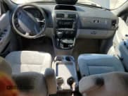 ✅ 2005 Kia Sedona LX • VIN: KNDUP131956617683 • Lot: 71478805. Wystawiony na Copart z przebiegiem 210 366 mil. Bezpłatny archiwum sprzedaży aukcyjnych z USA i szczegółowy raport historii pojazdu na DreamBid. Zdjęcie 8.