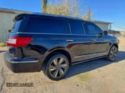 ✅ 2019 Lincoln Navigator Reserve • VIN: 5LMJJ2LT3KEL21970 • Lot: 94806815. Listed on Copart with 87,274 mi. Free auction sales archive from the USA and detailed vehicle history report at DreamBid. Image 4.