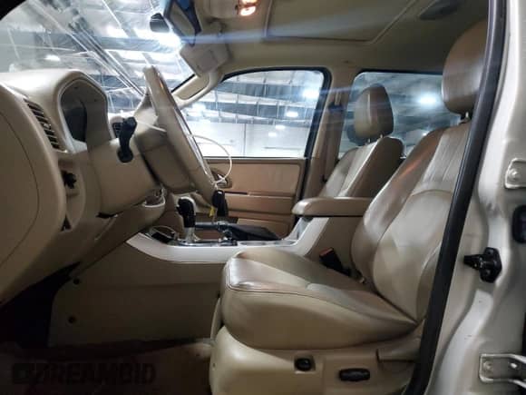 2007 Mercury Mariner Premier с VIN 4M2CU97127KJ20010, выставлен на аукционе Copart как лот 52123205 с пробегом 162 337 миль миль и Списание • Salvage title. История ставок и продаж доступна на DreamBid. Изображение 7.