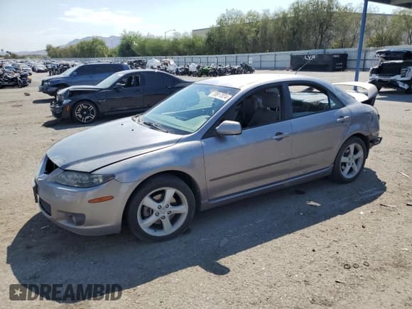✅ 2006 Mazda 6 i • VIN: 1YVHP80C665M10394 • Lot: 46084005. Listed on Copart with 215,913 mi. Free auction sales archive from the USA and detailed vehicle history report at DreamBid. Image 1.