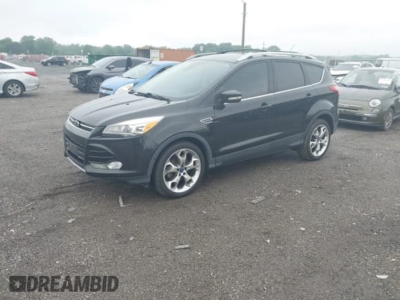 ✅ 2015 Ford Escape Titanium • VIN: 1FMCU0JX7FUB00462 • Lot: 42532943. Listed on IAAI with 88,623 mi. Free auction sales archive from the USA and detailed vehicle history report at DreamBid. Image 2.