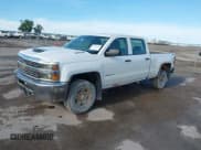 ✅ 2017 Chevrolet Silverado 2500HD Work Truck • VIN: 1GC1KUEYXHF225748 • Lot: 42691810. Listed on IAAI with 119,151 mi. Free auction sales archive from the USA and detailed vehicle history report at DreamBid. Image 22.