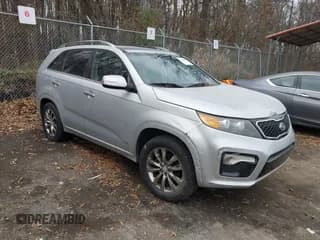 ✅ 2013 Kia Sorento SX • VIN: 5XYKWDA26DG381402 • Lot: 43934347. Listed on IAAI with 118,638 mi. Free auction sales archive from the USA and detailed vehicle history report at DreamBid. Image 1.