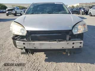 2004 Chevrolet Malibu LT z VIN 1G1ZU54834F103515, wystawiony jako Copart lot #62244354 z przebiegiem 158 644 mil mil oraz Szkoda całkowita • Salvage title. Historia ofert i sprzedaży dostępna na DreamBid. Obrazek 5.