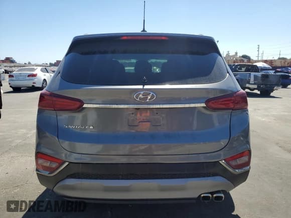 ✅ 2020 Hyundai Santa Fe SE • VIN: 5NMS23ADXLH141281 • Лот: 72071475. Опубликован ранее на Copart с пробегом Не указан. Бесплатный доступ к архиву аукционных продаж из США и подробный отчёт об истории автомобиля на DreamBid. Изображение 6.