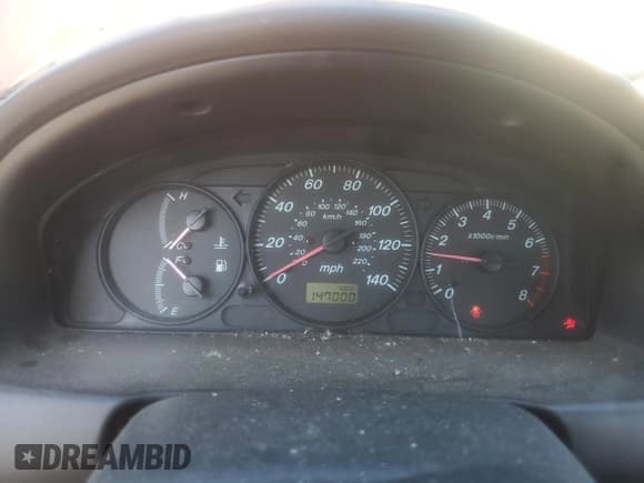 ✅ 2002 Mazda Protege DX • VIN: JM1BJ225921608283 • Лот: 80679005. Опубликован ранее на Copart с пробегом 147 000 миль. Бесплатный доступ к архиву аукционных продаж из США и подробный отчёт об истории автомобиля на DreamBid. Изображение 9.