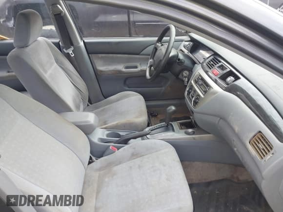 ✅ 2004 Mitsubishi Lancer ES • VIN: JA3AJ26E74U061200 • Lot: 43745112. Listed on IAAI with 276,250 mi. Free auction sales archive from the USA and detailed vehicle history report at DreamBid. Image 5.