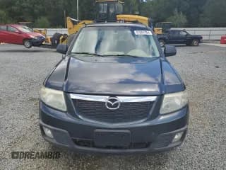 ✅ 2009 Mazda Tribute Sport • VIN: 4F2CZ02719KM07291 • Lot: 61084784. Wystawiony na Copart z przebiegiem 199 556 mil. Bezpłatny archiwum sprzedaży aukcyjnych z USA i szczegółowy raport historii pojazdu na DreamBid. Zdjęcie 5.