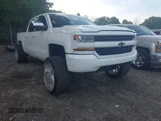 ✅ 2018 Chevrolet Silverado 1500 Custom • VIN: 3GCPCPEC8JG403089 • Lot: 42564363. Wystawiony na IAAI z przebiegiem 117 103 mil. Bezpłatny archiwum sprzedaży aukcyjnych z USA i szczegółowy raport historii pojazdu na DreamBid. Zdjęcie 1.