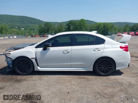 ✅ 2017 Subaru WRX STI • VIN: JF1VA2M64H9831592 • Lot: 42424726. Listed on IAAI with 90,595 mi. Free auction sales archive from the USA and detailed vehicle history report at DreamBid. Image 15.