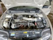 ✅ 2001 Pontiac Sunfire SE • VIN: 1G2JB524X17106500 • Lot: 69760215. Wystawiony na Copart z przebiegiem 105 767 mil. Bezpłatny archiwum sprzedaży aukcyjnych z USA i szczegółowy raport historii pojazdu na DreamBid. Zdjęcie 11.