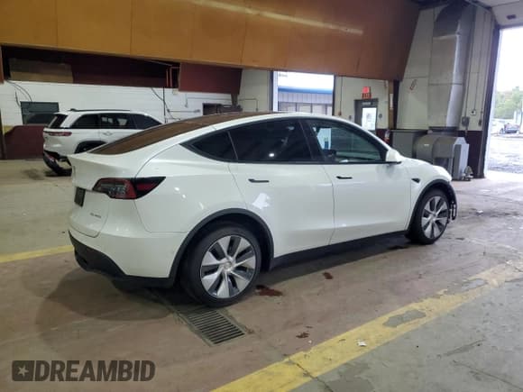 ✅ 2022 Tesla Model Y Long Range • VIN: 7SAYGDEE6NF422716 • Лот: 84958725. Опубликован ранее на Copart с пробегом 45 567 миль. Бесплатный доступ к архиву аукционных продаж из США и подробный отчёт об истории автомобиля на DreamBid. Изображение 3.