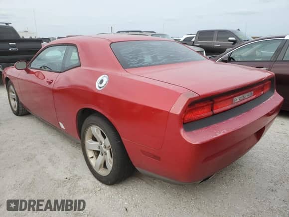 2012 Dodge Challenger SXT z VIN 2C3CDYAG9CH210824, wystawiony jako Copart lot #76201764 z przebiegiem 97 698 mil mil oraz Nie do naprawy • Non repairable. Historia ofert i sprzedaży dostępna na DreamBid. Obrazek 2.