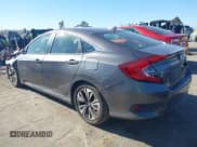 ✅ 2018 Honda Civic EX-T • VIN: JHMFC1F34JX008280 • Lot: 43809009. Listed on IAAI with 122,246 mi. Free auction sales archive from the USA and detailed vehicle history report at DreamBid. Image 3.