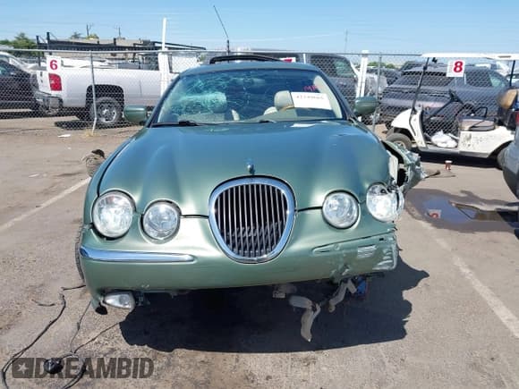 ✅ 2000 Jaguar S-Type V6 • VIN: SAJDA01C9YFL32939 • Lot: 42349665. Wystawiony na IAAI z przebiegiem 227 143 mil. Bezpłatny archiwum sprzedaży aukcyjnych z USA i szczegółowy raport historii pojazdu na DreamBid. Zdjęcie 13.