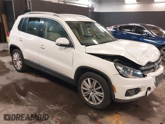 ✅ 2013 Volkswagen Tiguan S • VIN: WVGBV3AX2DW077930 • Lot: 43516995. Listed on IAAI with 86,882 mi. Free auction sales archive from the USA and detailed vehicle history report at DreamBid. Image 1.
