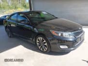 ✅ 2014 Kia Optima SX Turbo • VIN: 5XXGR4A65EG262195 • Lot: 42369500. Listed on IAAI with 163,009 mi. Free auction sales archive from the USA and detailed vehicle history report at DreamBid. Image 1.