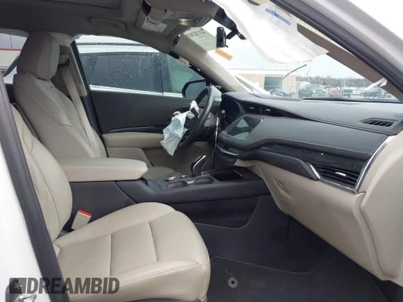 ✅ 2022 Cadillac XT4 FWD Premium Luxury • VIN: 1GYFZCR42NF124440 • Lot: 41183073. Listed on IAAI with 47,763 mi. Free auction sales archive from the USA and detailed vehicle history report at DreamBid. Image 5.
