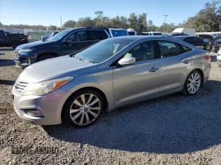 ✅ 2012 Hyundai Azera • VIN: KMHFH4JG6CA179001 • Lot: 92294655. Listed on Copart with 177,690 mi. Free auction sales archive from the USA and detailed vehicle history report at DreamBid. Image 1.