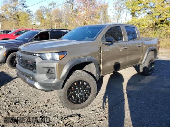 2023 Chevrolet Colorado 4WD Trail Boss z VIN 1GCPTEEK9P1139013, wystawiony jako Copart lot #90549425 z przebiegiem 263 mil mil oraz Nie do naprawy • Non repairable. Historia ofert i sprzedaży dostępna na DreamBid. Obrazek 1.