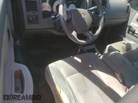 2005 Dodge Dakota ST с VIN 1D7HE22K45S153545, выставлен на аукционе Copart как лот 70364364 с пробегом 169 212 миль миль и Списание • Salvage title. История ставок и продаж доступна на DreamBid. Изображение 8.