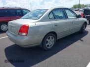 ✅ 2003 Hyundai Elantra GLS • VIN: KMHDN45D83U514659 • Lot: 42016920. Listed on IAAI with 125,673 mi. Free auction sales archive from the USA and detailed vehicle history report at DreamBid. Image 4.