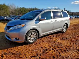 ✅ 2016 Toyota Sienna XLE • VIN: 5TDYK3DC6GS733597 • Lot: 94453025. Listed on Copart with 122,395 mi. Free auction sales archive from the USA and detailed vehicle history report at DreamBid. Image 1.