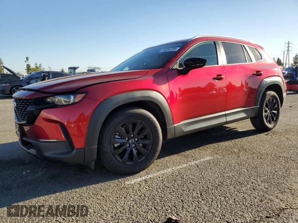 ✅ 2024 Mazda CX-50 S Premium • VIN: 7MMVABDMXRN217714 • Lot: 90884395. Listed on Copart with 6,518 mi. Free auction sales archive from the USA and detailed vehicle history report at DreamBid. Image 1.
