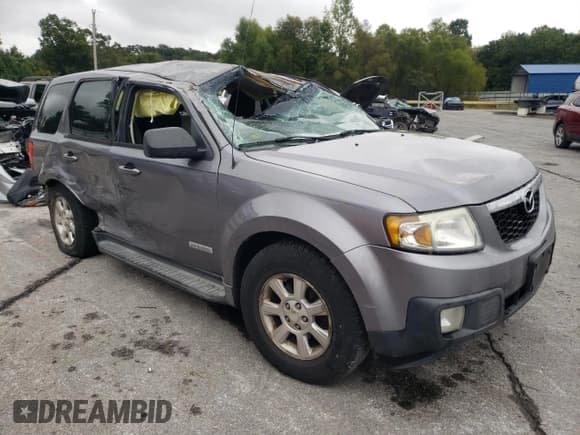 ✅ 2008 Mazda Tribute Grand Touring • VIN: 4F2CZ06108KM05634 • Lot: 71281564. Listed on Copart with Not provided. Free auction sales archive from the USA and detailed vehicle history report at DreamBid. Image 4.