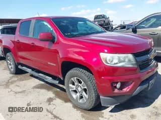 2018 Chevrolet Colorado 2WD Z71 z VIN 1GCGSDEN5J1308006, wystawiony jako IAAI lot #43427238 z przebiegiem 132 111 mil mil oraz . Historia ofert i sprzedaży dostępna na DreamBid. Obrazek 1.