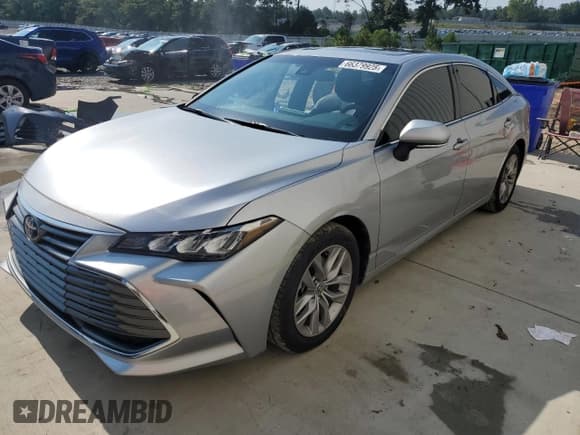 ✅ 2022 Toyota Avalon Hybrid XLE • VIN: 4T1AA1AB0NU014676 • Лот: 66379925. Опубликован ранее на Copart с пробегом 52 708 миль. Бесплатный доступ к архиву аукционных продаж из США и подробный отчёт об истории автомобиля на DreamBid. Изображение 1.