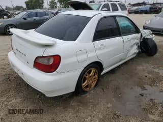 ✅ 2002 Subaru Impreza RS • VIN: JF1GD67582G506456 • Lot: 60404365. Listed on Copart with 271,575 mi. Free auction sales archive from the USA and detailed vehicle history report at DreamBid. Image 3.