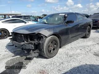 2019 Dodge Charger Police with VIN 2C3CDXAT7KH703584, listed as a Copart auction lot 63943735 with Not provided miles and Clean title. Bid and sale history available at DreamBid. Image 1.