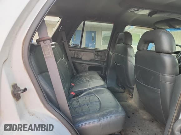 ✅ 1997 GMC Jimmy SLT • VIN: 1GKDT13W0V2549003 • Lot: 63618365. Listed on Copart with 230,977 mi. Free auction sales archive from the USA and detailed vehicle history report at DreamBid. Image 11.