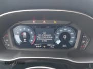 ✅ 2021 Audi Q3 S line Premium • VIN: WA1DECF31M1024386 • Lot: 42043662. Wystawiony na IAAI z przebiegiem 48 144 mil. Bezpłatny archiwum sprzedaży aukcyjnych z USA i szczegółowy raport historii pojazdu na DreamBid. Zdjęcie 7.