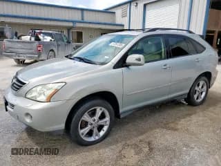 ✅ 2006 Lexus RX 400h • VIN: JTJGW31U260004024 • Лот: 57281205. Опубликован ранее на Copart с пробегом 166 426 миль. Бесплатный доступ к архиву аукционных продаж из США и подробный отчёт об истории автомобиля на DreamBid. Изображение 1.