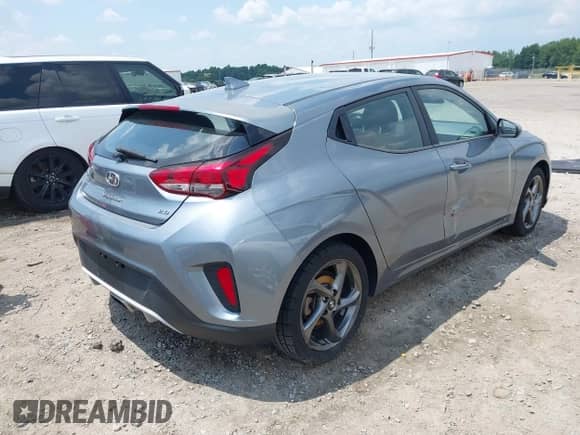 2019 Hyundai Veloster Premium with VIN KMHTG6AF5KU017950, listed as a IAAI auction lot 42611554 with 105,396 mi miles and . Bid and sale history available at DreamBid. Image 4.