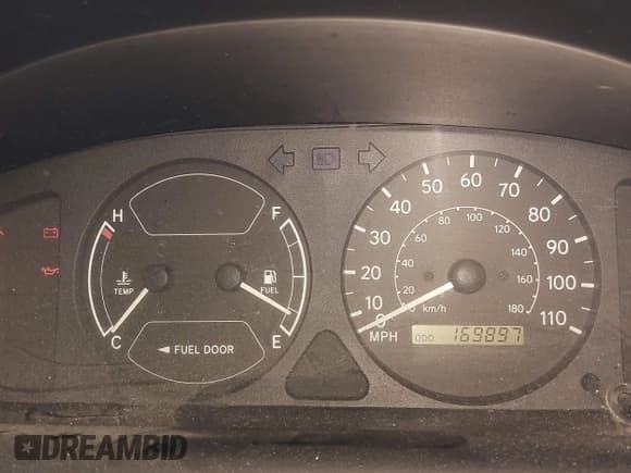 ✅ 1999 Toyota Corolla VE • VIN: 1NXBR12E0XZ197084 • Lot: 43220717. Listed on IAAI with 169,897 mi. Free auction sales archive from the USA and detailed vehicle history report at DreamBid. Image 7.