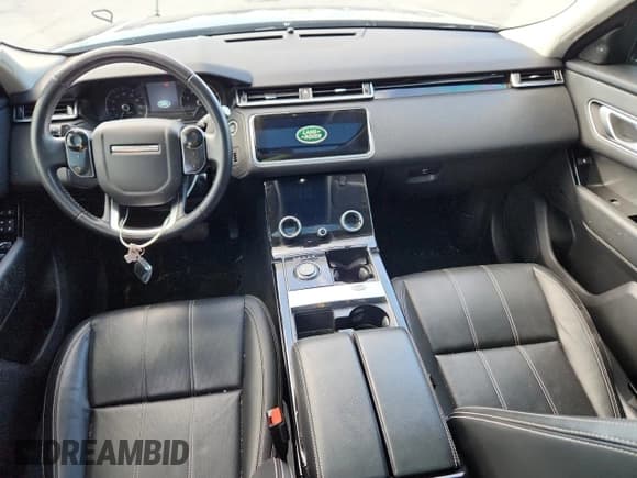 ✅ 2020 Land Rover Range Rover Velar S • VIN: SALYB2EX6LA265169 • Лот: 85699105. Опубликован ранее на Copart с пробегом 75 336 миль. Бесплатный доступ к архиву аукционных продаж из США и подробный отчёт об истории автомобиля на DreamBid. Изображение 8.