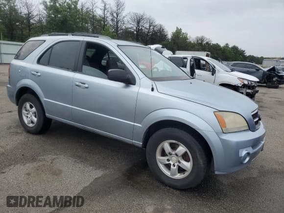 ✅ 2006 Kia Sorento LX • VIN: KNDJC733X65521104 • Lot: 63193005. Listed on Copart with 99,705 mi. Free auction sales archive from the USA and detailed vehicle history report at DreamBid. Image 4.
