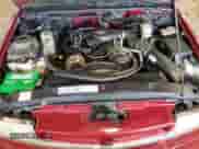 2003 Chevrolet Blazer LS z VIN 1GNCT18X13K165163, wystawiony jako Copart lot #78693034 z przebiegiem 159 770 mil mil oraz Szkoda całkowita • Salvage title. Historia ofert i sprzedaży dostępna na DreamBid. Obrazek 12.