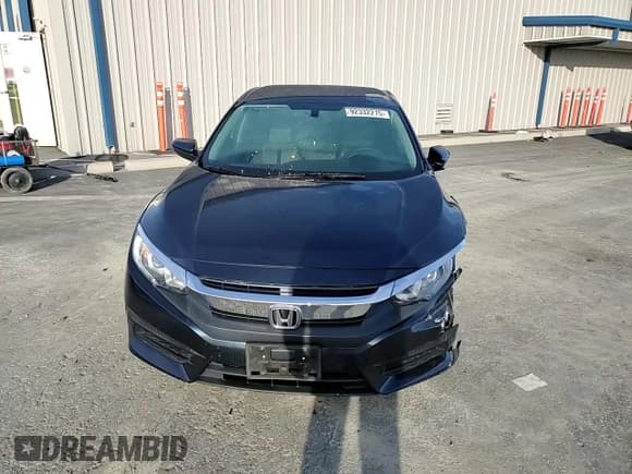 ✅ 2017 Honda Civic LX • VIN: 19XFC2F5XHE219082 • Lot: 92332275. Wystawiony na Copart z przebiegiem 78 440 mil. Bezpłatny archiwum sprzedaży aukcyjnych z USA i szczegółowy raport historii pojazdu na DreamBid. Zdjęcie 13.
