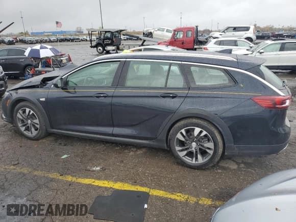 ✅ 2018 Buick Regal Essence • VIN: W04GV8SX2J1132868 • Лот: 89534535. Опубликован ранее на Copart с пробегом 76 432 миль. Бесплатный доступ к архиву аукционных продаж из США и подробный отчёт об истории автомобиля на DreamBid. Изображение 2.