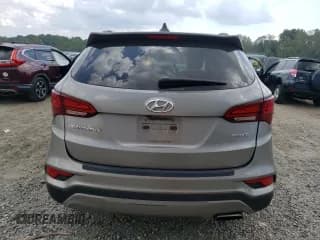 ✅ 2017 Hyundai Santa Fe 2.4L • VIN: 5NMZU3LB2HH039940 • Лот: 62647214. Опубликован ранее на Copart с пробегом 84 793 миль. Бесплатный доступ к архиву аукционных продаж из США и подробный отчёт об истории автомобиля на DreamBid. Изображение 6.