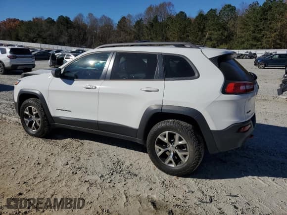 ✅ 2016 Jeep Cherokee Trailhawk • VIN: 1C4PJMBS8GW227719 • Lot: 93120535. Listed on Copart with 43,989 mi. Free auction sales archive from the USA and detailed vehicle history report at DreamBid. Image 2.