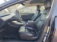 ✅ 2022 Tesla Model 3 • VIN: 5YJ3E1EAXNF304449 • Lot: 94233905. Wystawiony na Copart z przebiegiem 140 837 mil. Bezpłatny archiwum sprzedaży aukcyjnych z USA i szczegółowy raport historii pojazdu na DreamBid. Zdjęcie 7.