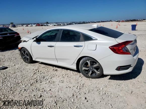 ✅ 2017 Honda Civic Touring • VIN: 19XFC1F92HE008228 • Lot: 91644875. Listed on Copart with 96,339 mi. Free auction sales archive from the USA and detailed vehicle history report at DreamBid. Image 2.