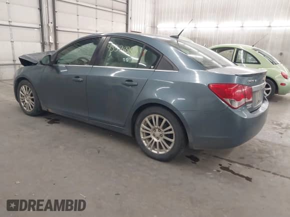 2012 Chevrolet Cruze ECO z VIN 1G1PJ5SC9C7247585, wystawiony jako IAAI lot #43576547 z przebiegiem 245 924 mil mil oraz . Historia ofert i sprzedaży dostępna na DreamBid. Obrazek 3.